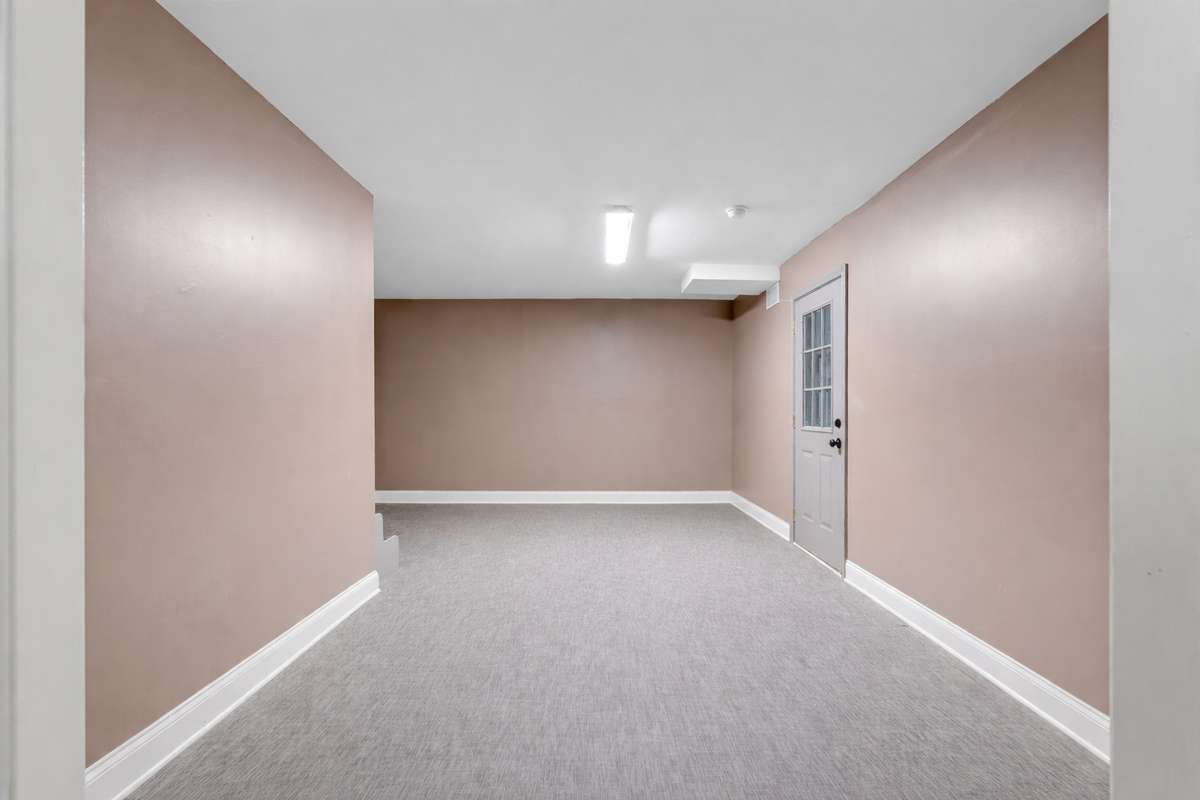 Head downstairs to find an additional bedroom & bonus room! 645 Wildwood Trace, Winchester, TN 37398