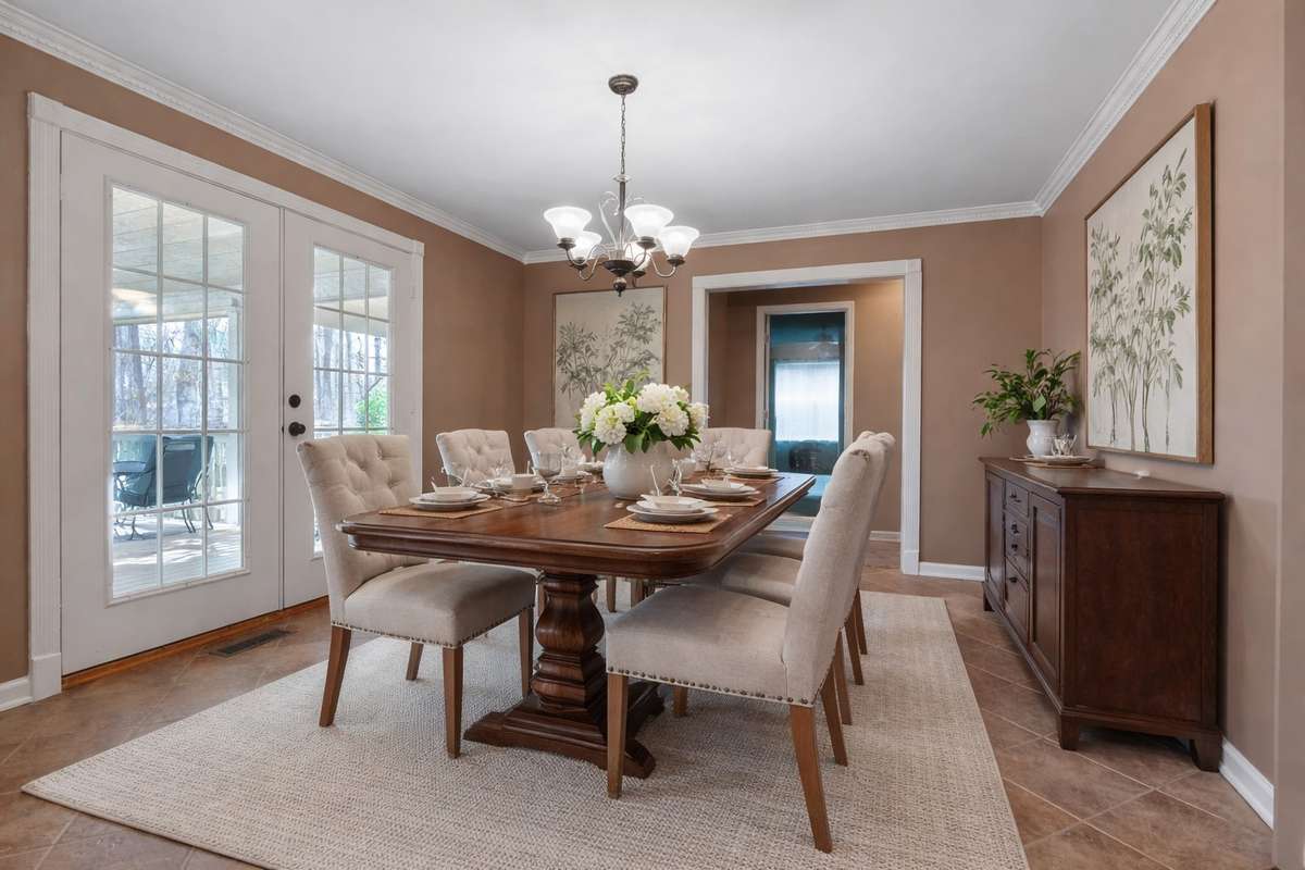 Dining room with crown molding, tile floor, French doors that overlook your amazing outdoor deck with a view! 645 Wildwood Trace, Winchester, TN 37398