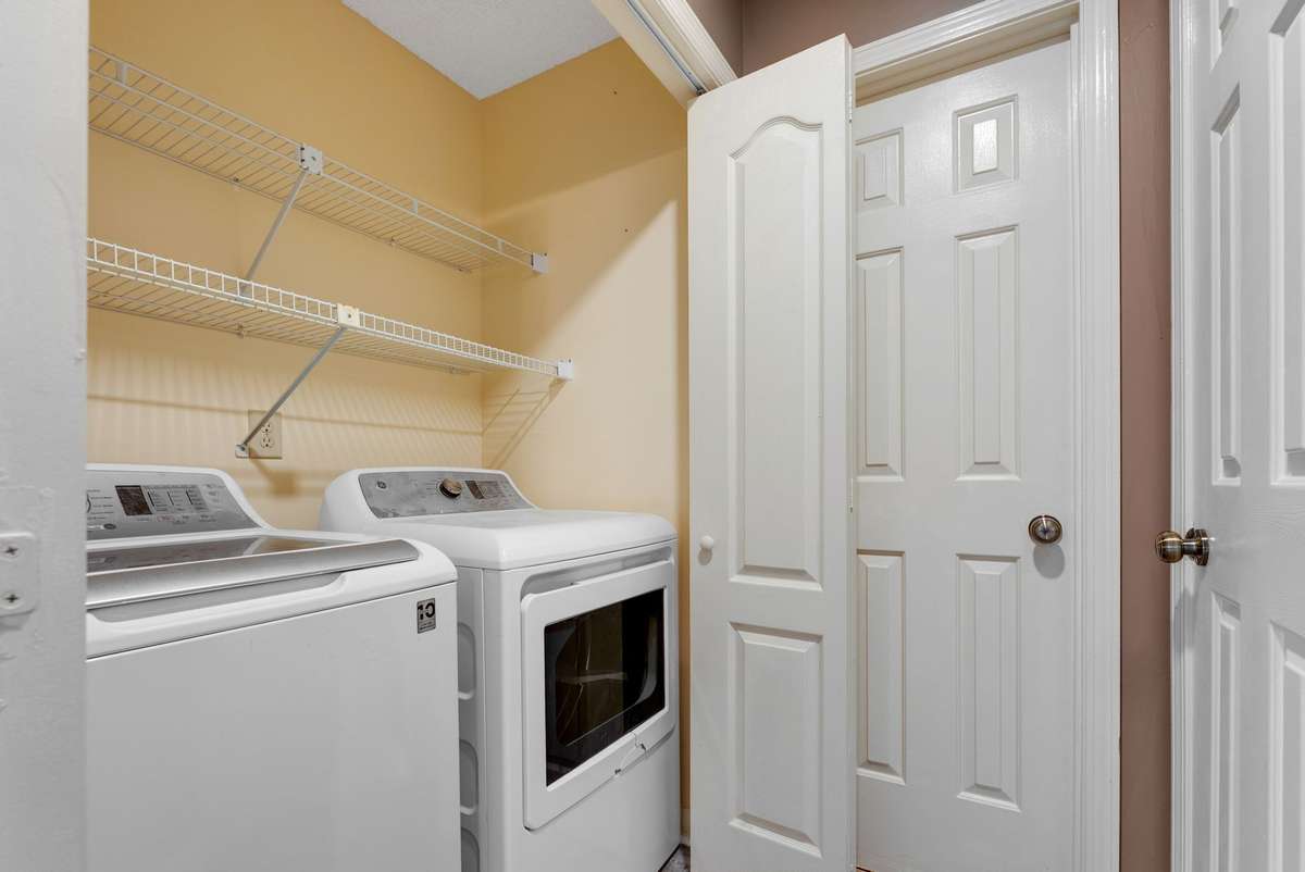 Utility closet with shelving on the main floor. 645 Wildwood Trace, Winchester, TN 37398