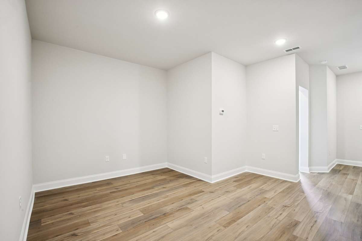 A versatile flex space or study is included on the lower level, perfect for a craft room, or additional living area.