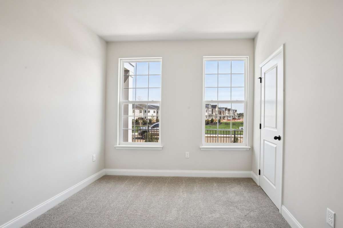 The second bedroom is located on the lower level, offering added privacy for both bedrooms and creating a versatile space for guests or family.