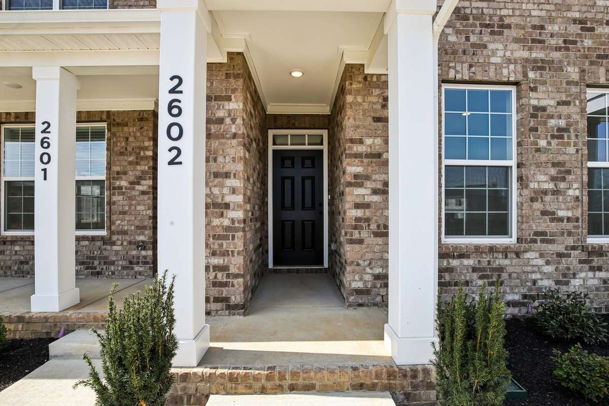 The Colonnade is a beautifully designed 2 Bed / 2.5 Bath townhouse offering 1,453 square feet of thoughtfully planned living space located directly across from a peaceful pond and just steps away from the future community pool.