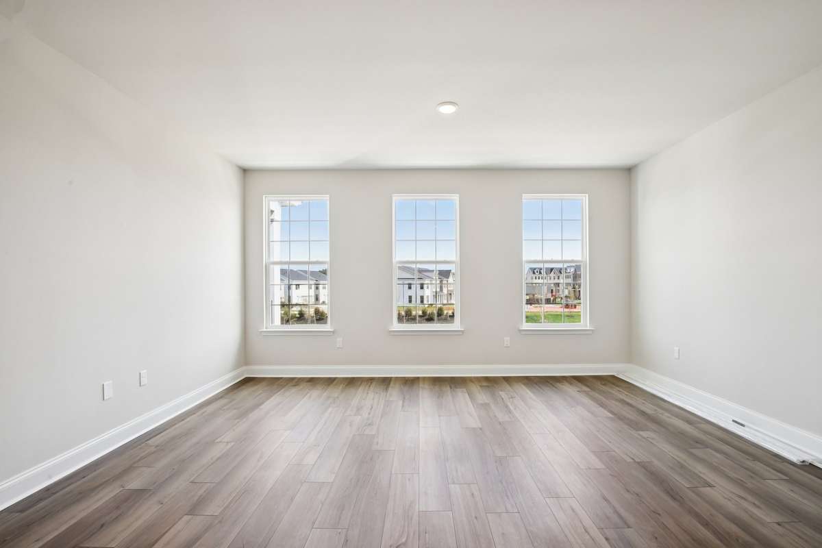 The great room offers ample space for arranging furniture, making it easy to create a comfortable and functional living area.