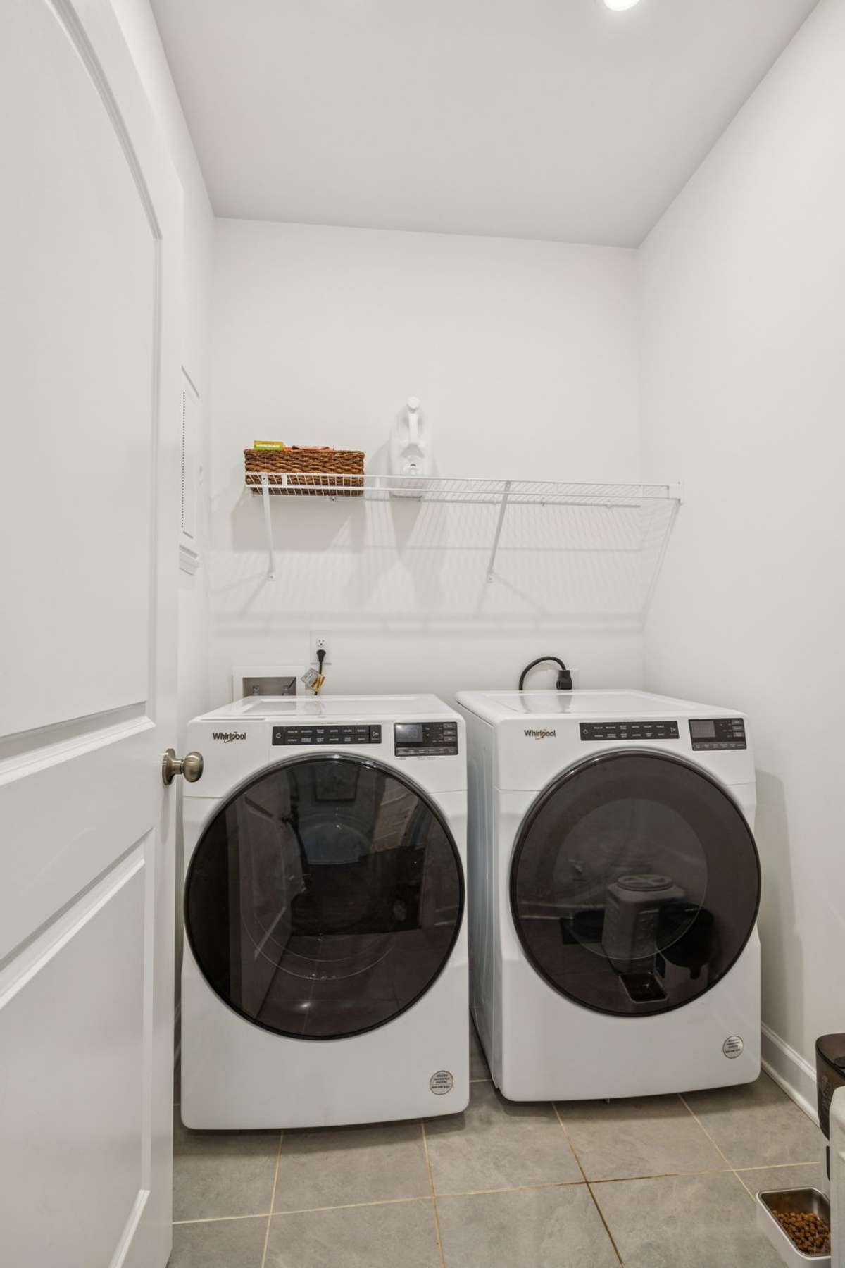 Laundry room located downstairs