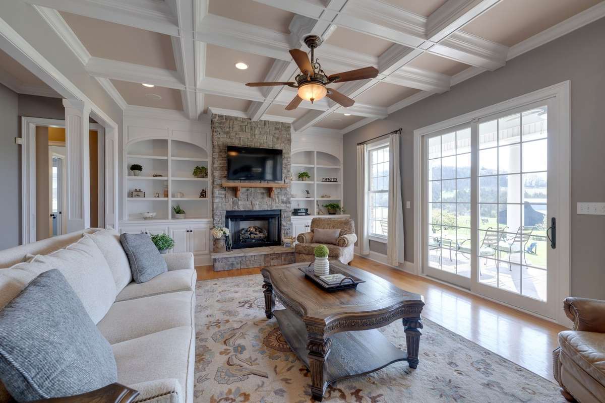 Coffered ceilings with stone fireplace and gas logs