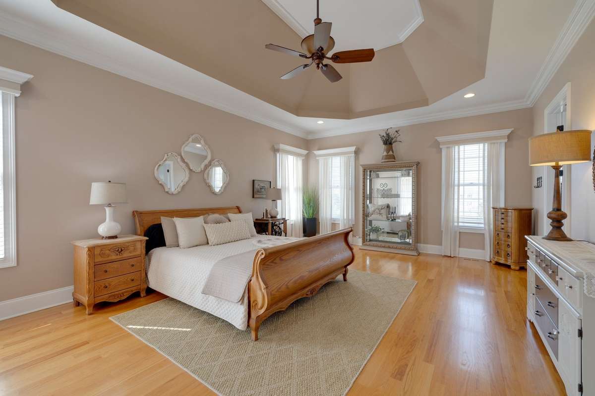 Huge primary retreat with ample lighting door out to your covered porch