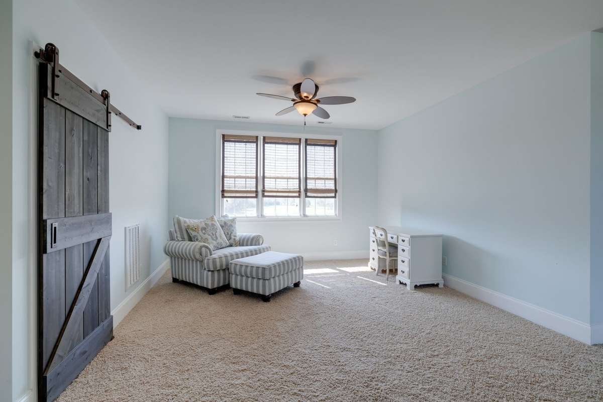 Upstairs nook leading into a wide open space