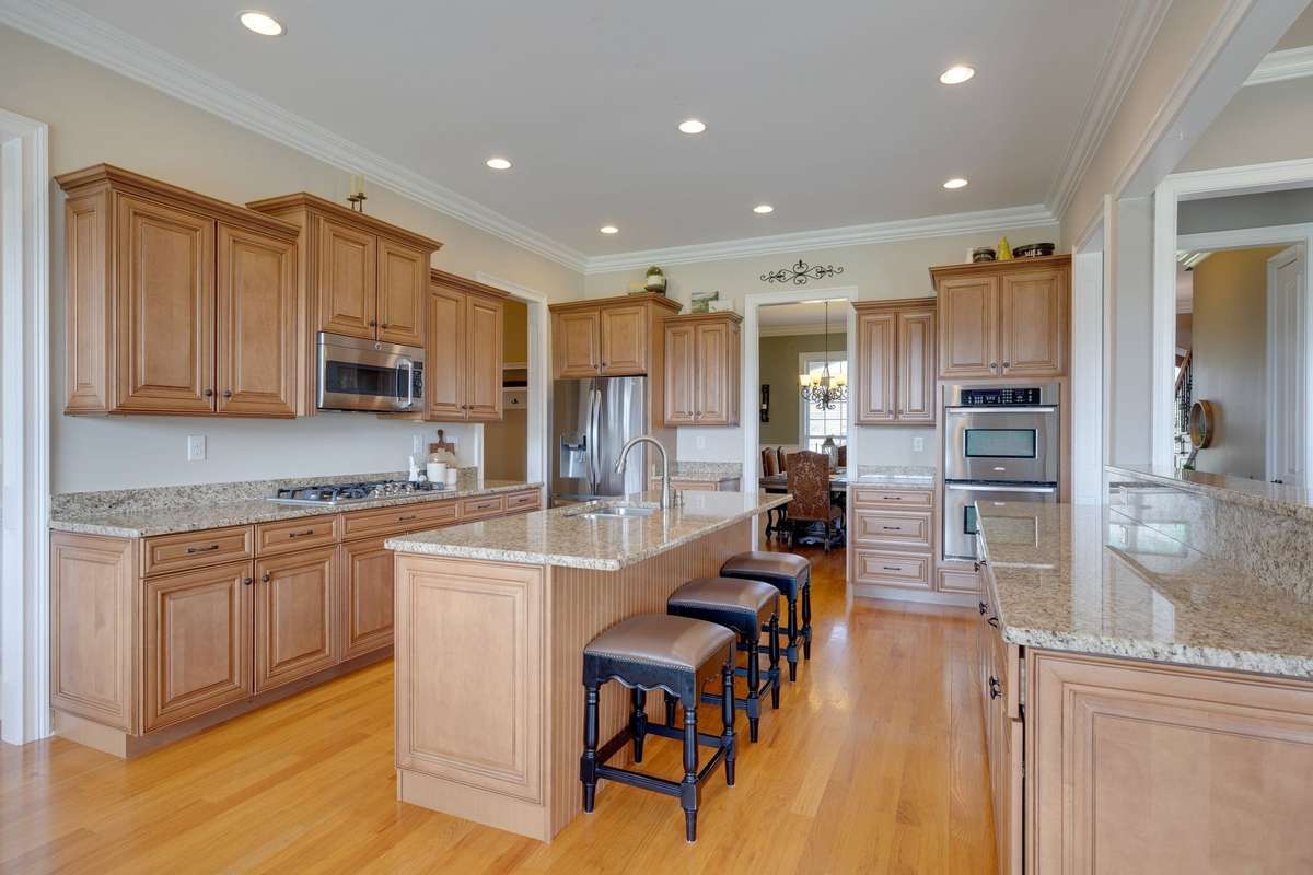 Double islands, perfect for hosting! This opens into the main living area and lets in plenty of lighting