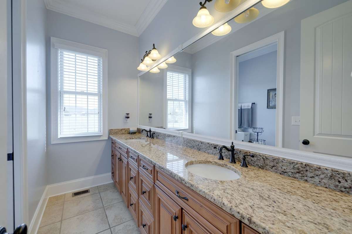 double vanities situated between both bedrooms downstairs