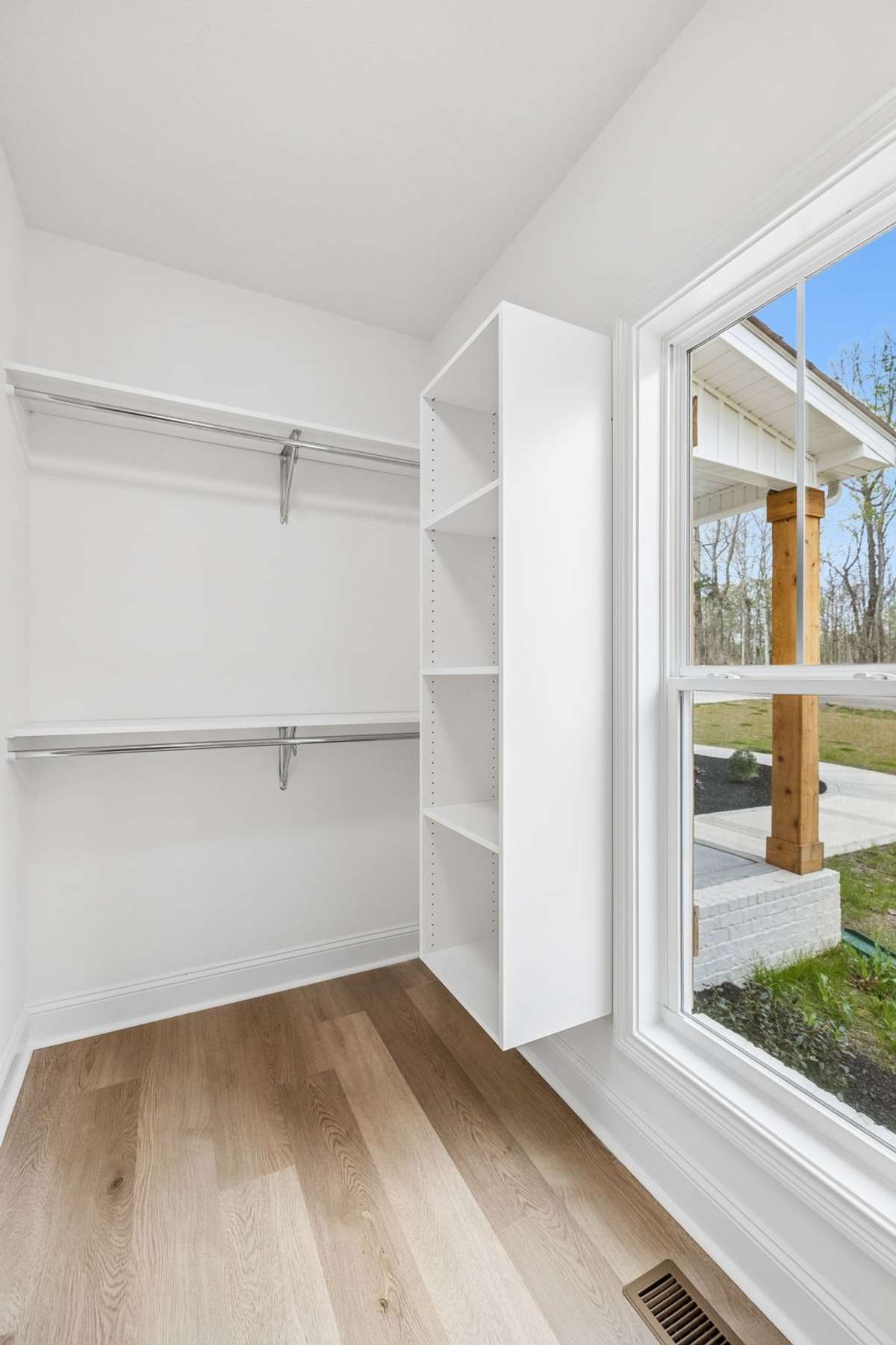 2nd view of primary walk in closet
