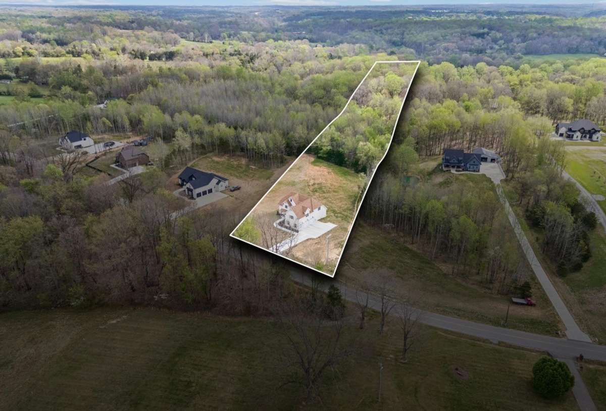 Property lines are not exact.  There are stakes marking the property lines on the property. This just gives you an idea showing property goes well in to the wooded area