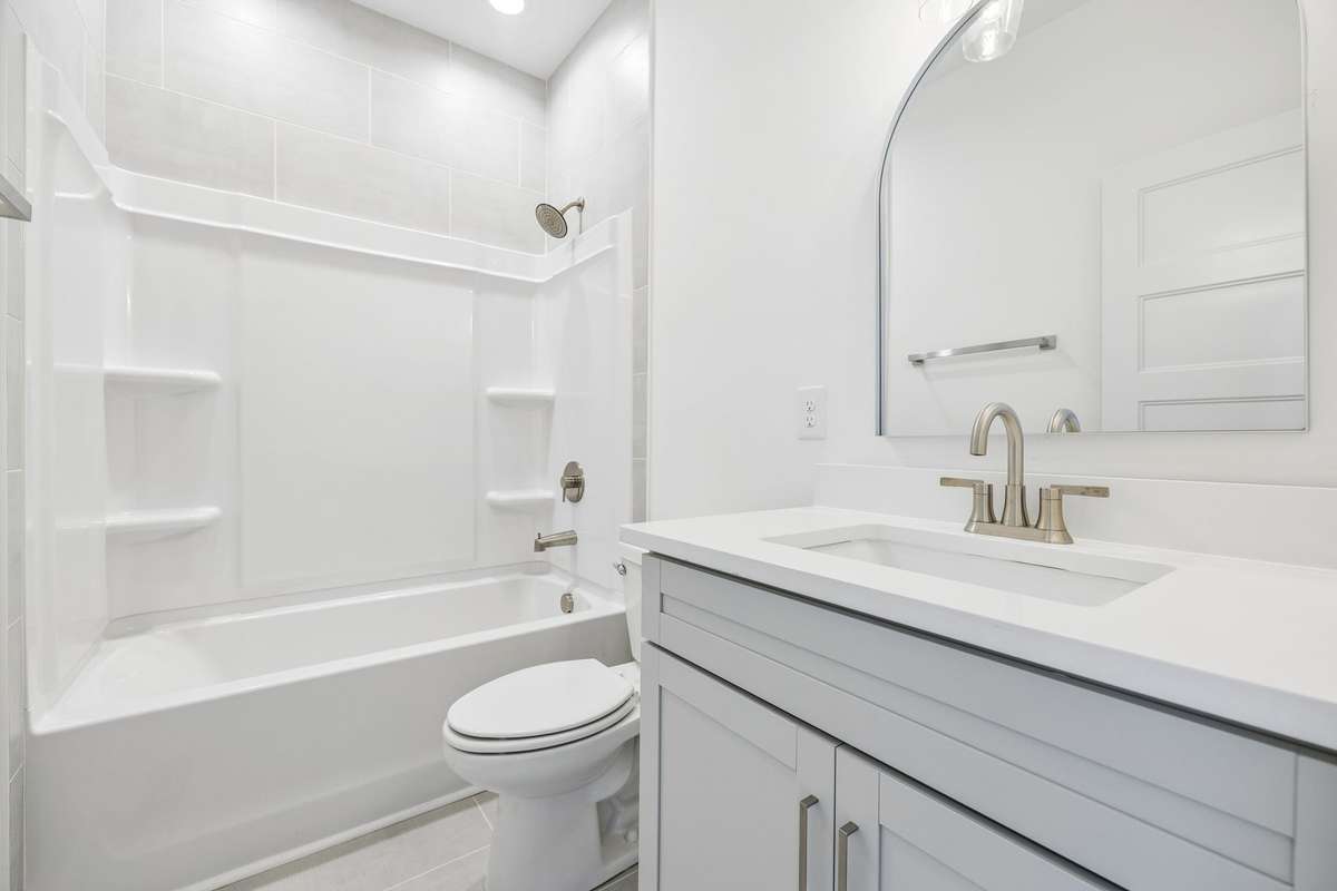 2nd full bath on main floor located next to the office