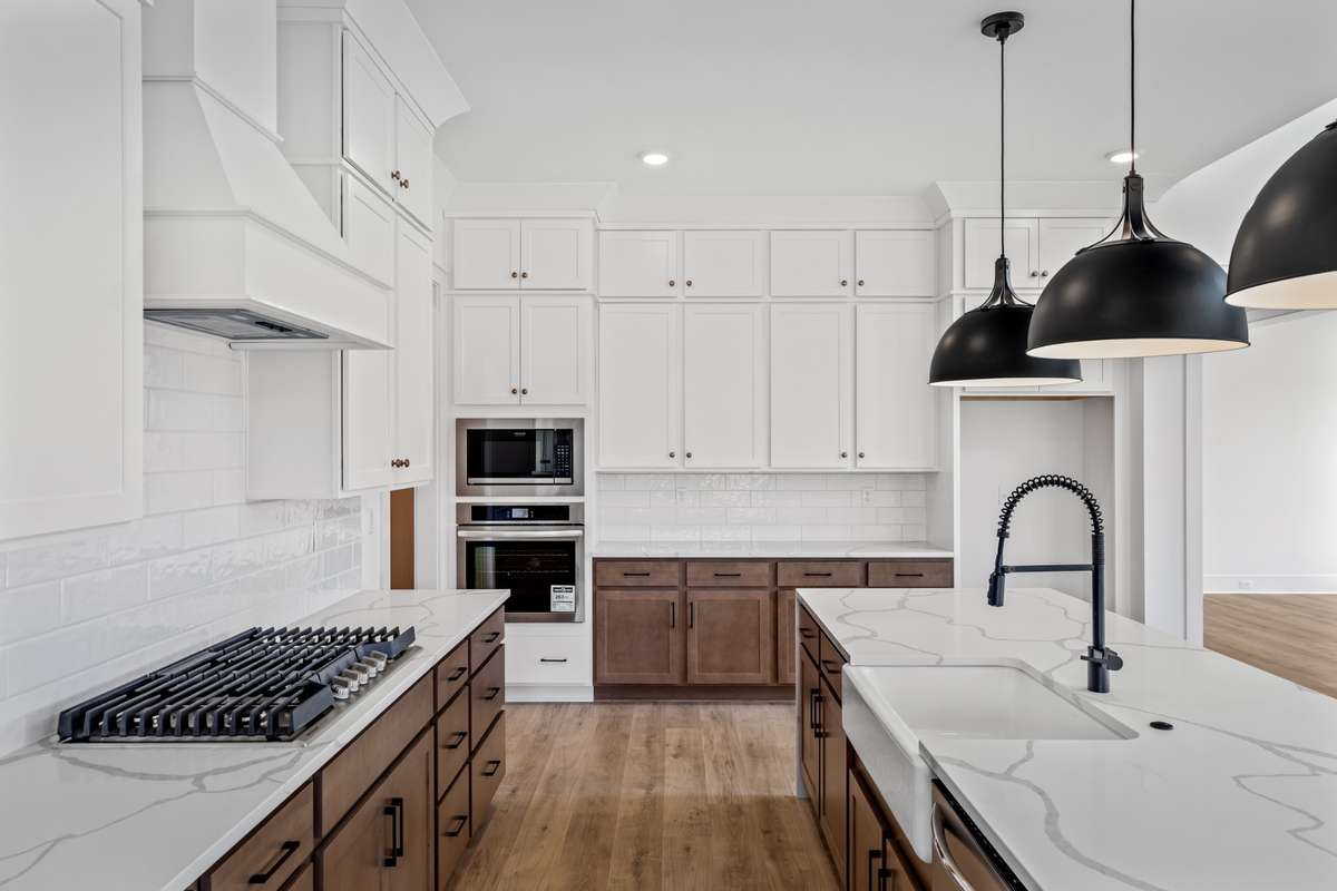 Finishes for actual home are located in the documents section of the listing