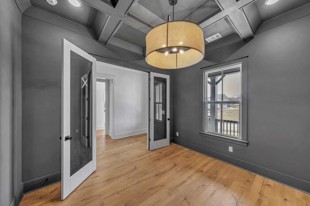 Across from the 1st floor guest  bedroom, there is a separate study if you work from home