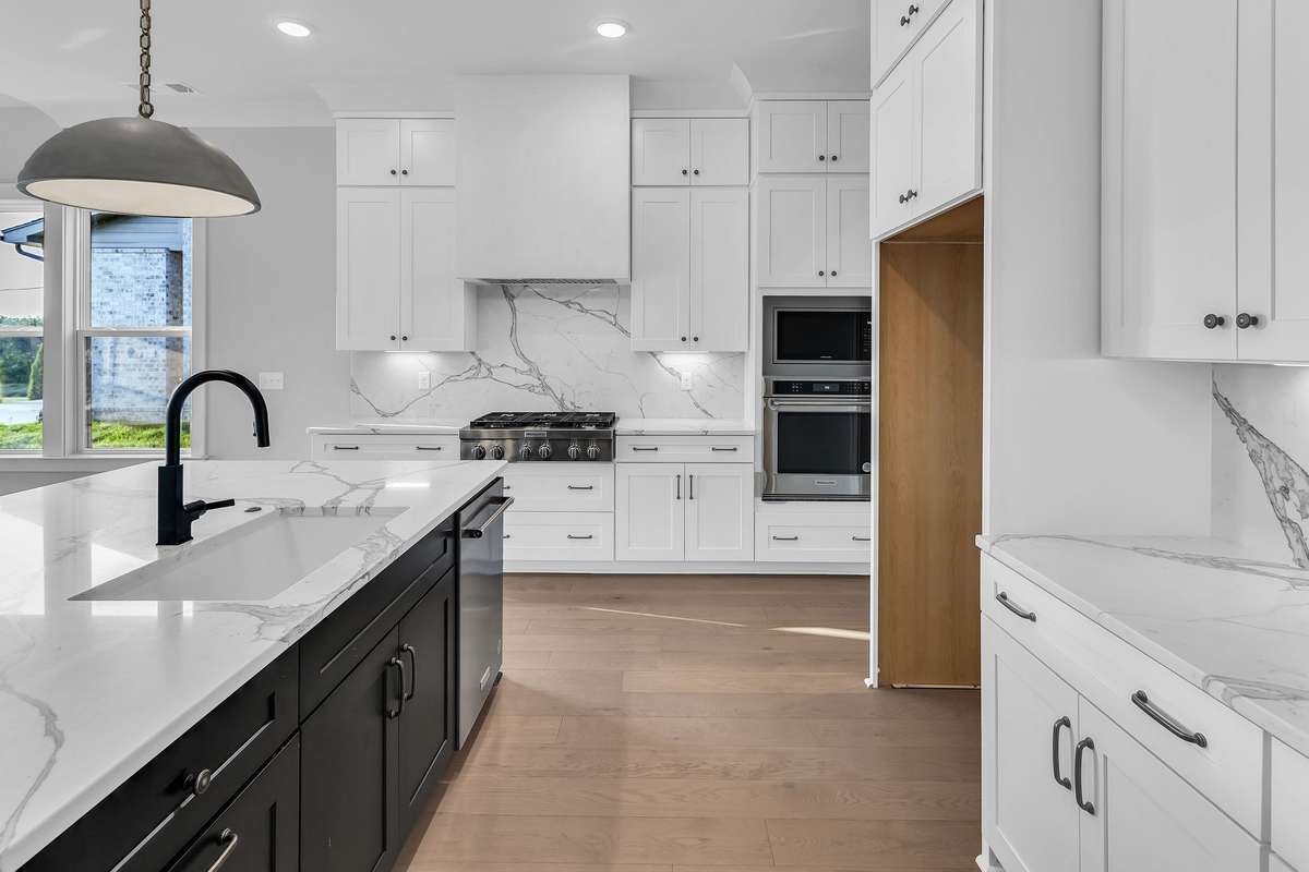 Photos are from a similar floorplan in another one of our Thompson's Station Communities.