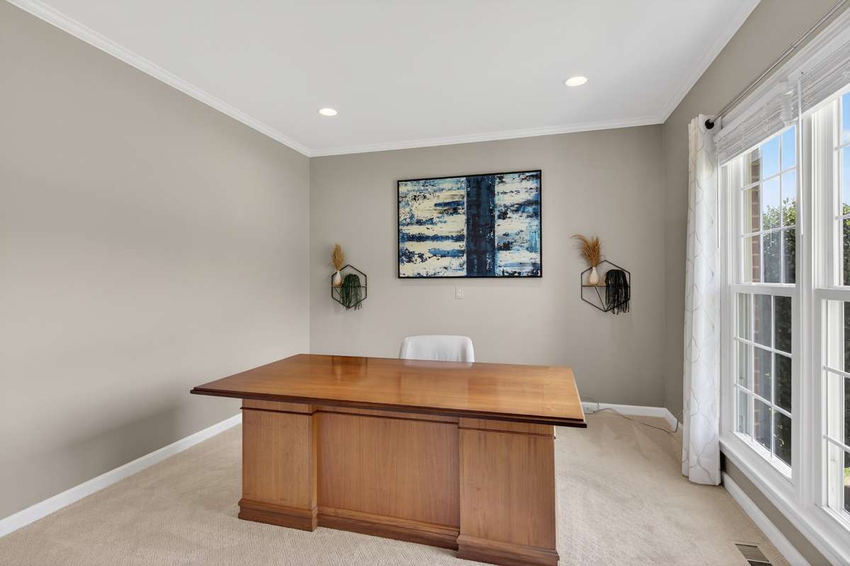 To the right of the foyer sits the perfect spot for an office, library, music/art studio, or even a downstairs playroom.