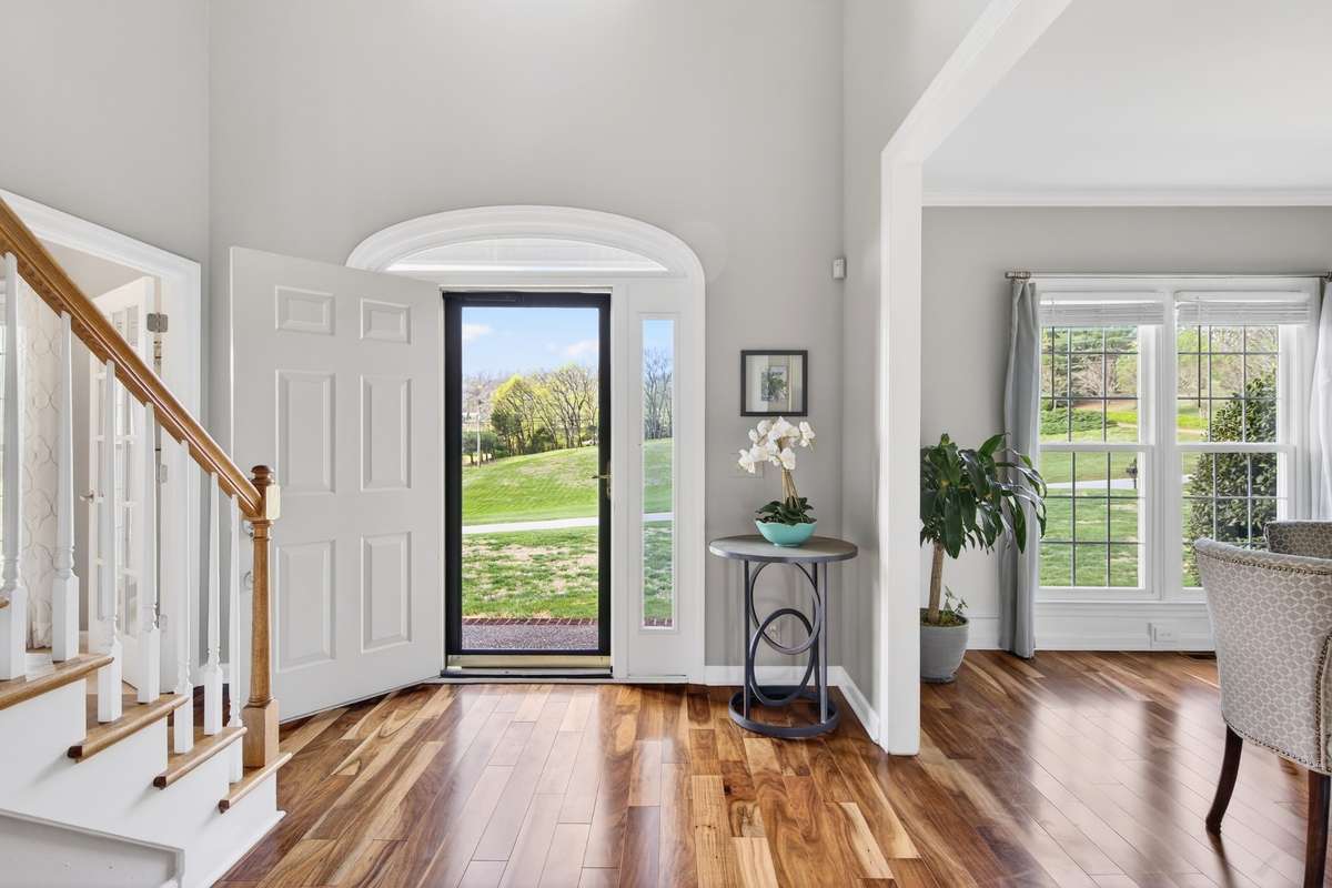 As you enter, the natural light reflects off the hardwood floors bringing warmth and a relaxing breath!