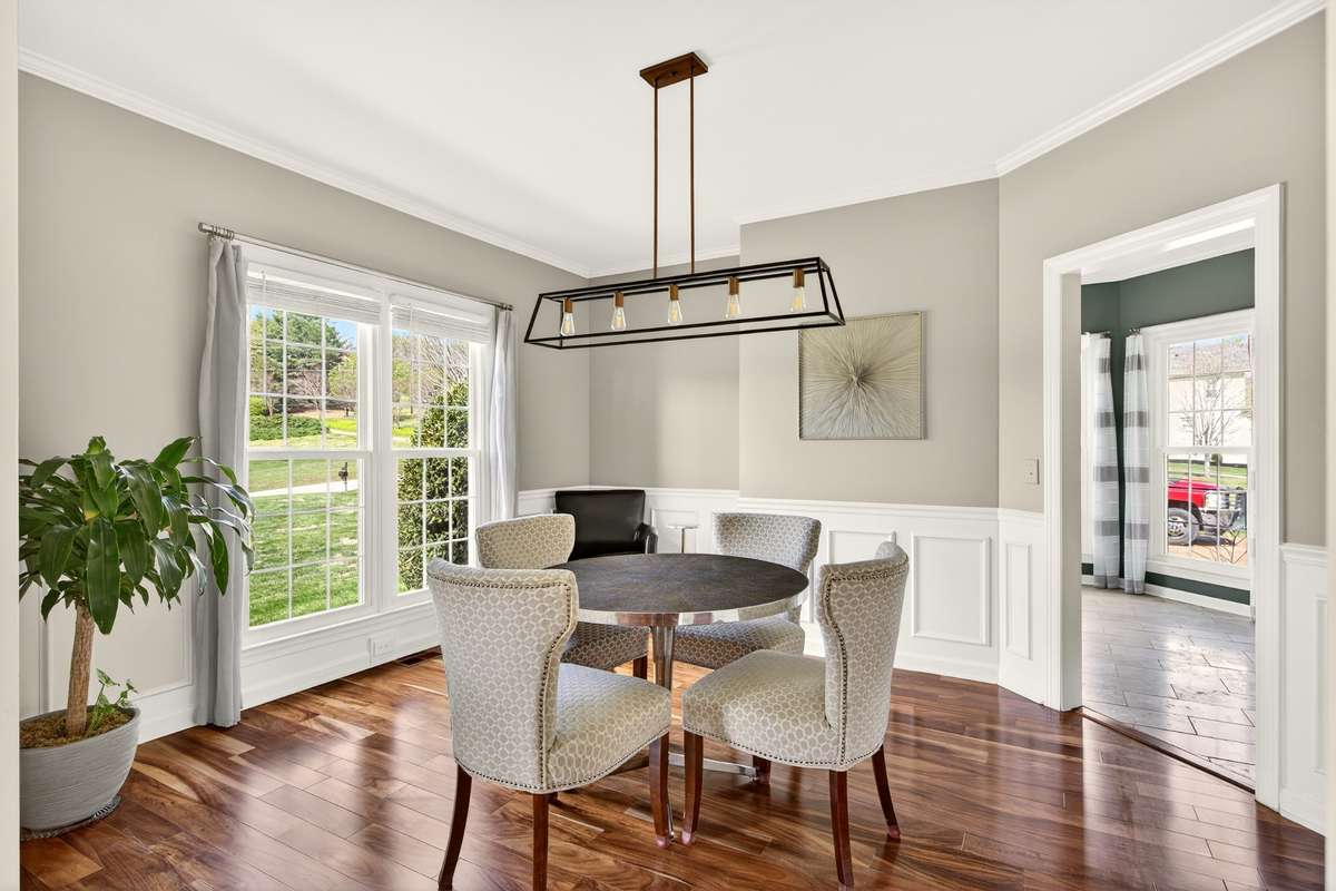 Notice all the extra trim/moldings as well as entry straight into the kitchen.
