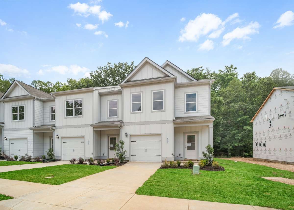 This picture is used for marketing purposes only, and it may not reflect the same exterior color package for building 14.  Ask agent for details or refer to first picture for exterior color.
