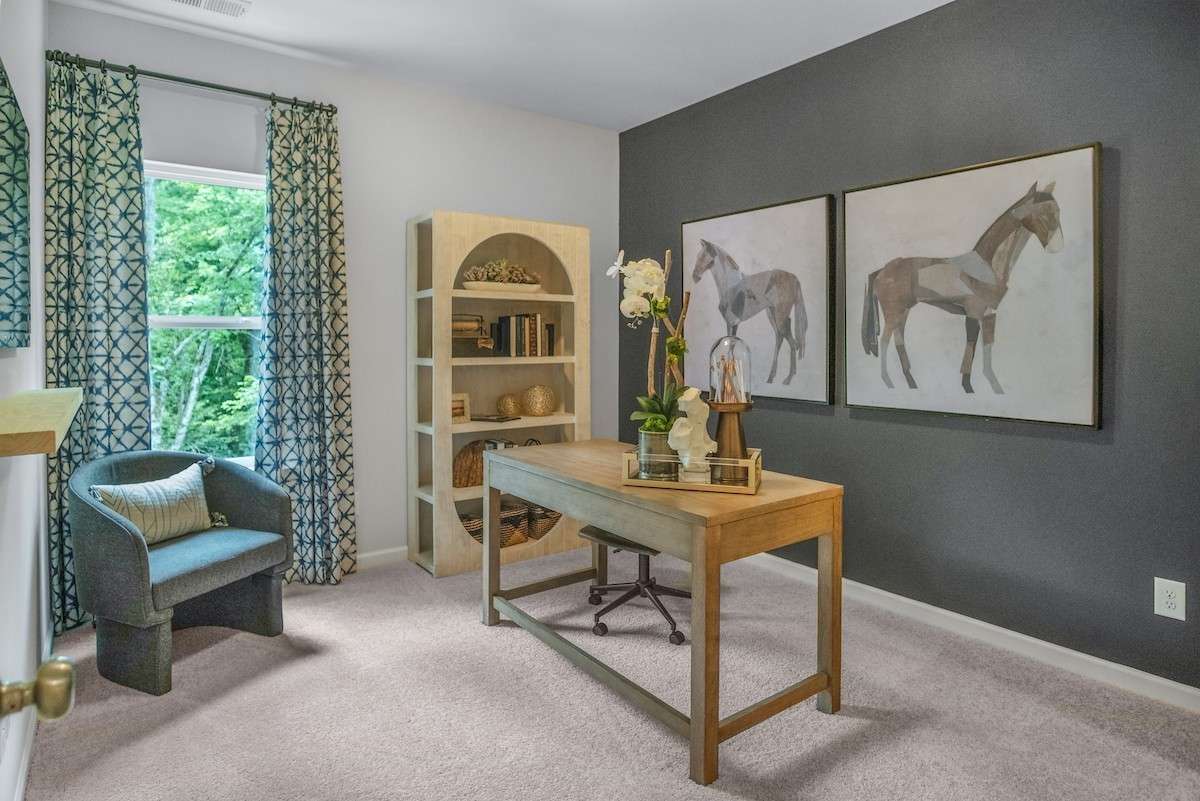 This picture is from our furnished and decorated model home in the community.  Window placement and color scheme may vary per unit location.  Ask agent for more specific details regarding color and options