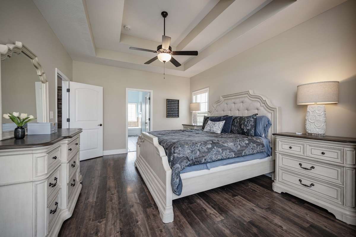 Dark hardwood flooring runs throughout.