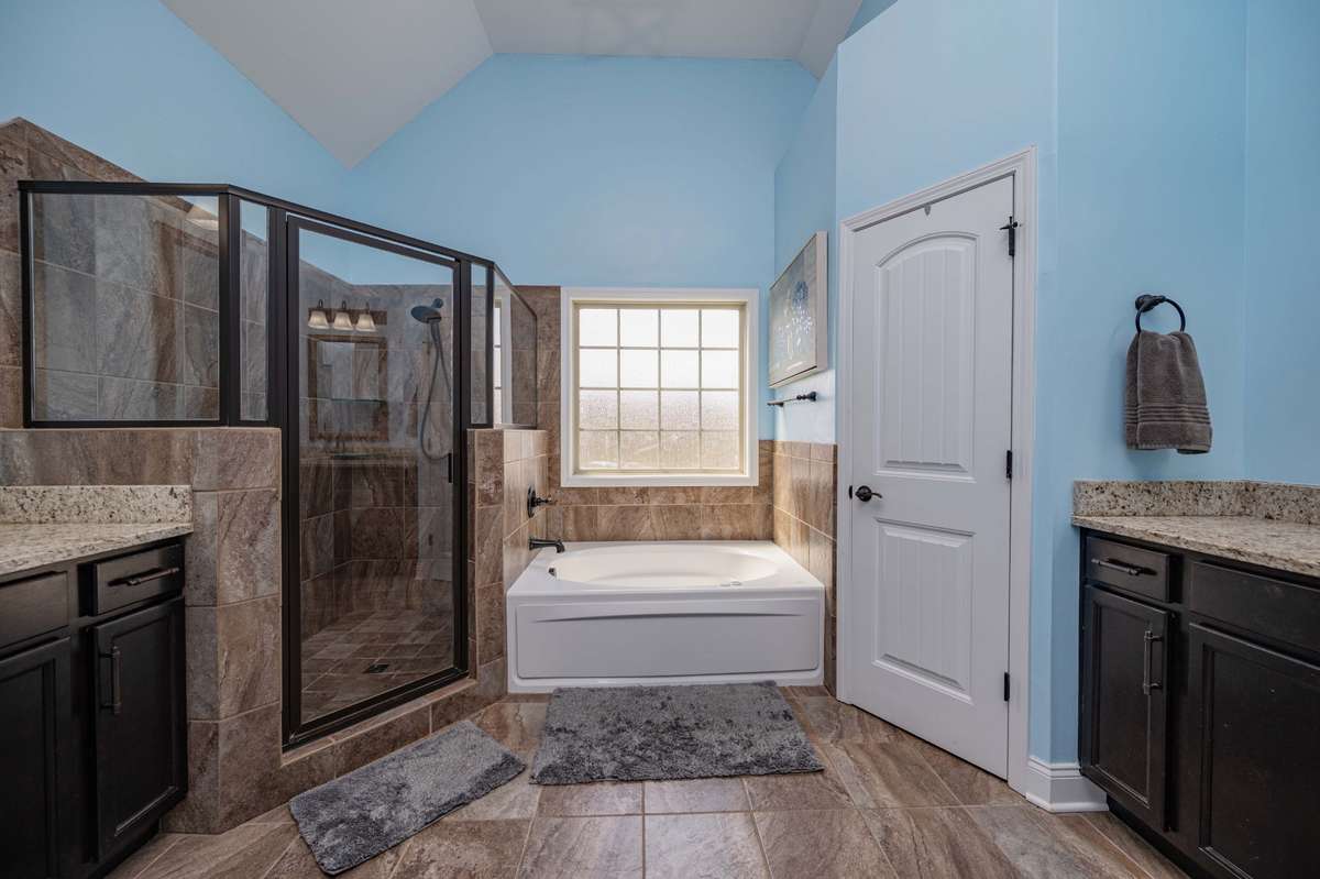 Separate tub and shower with dual vanities means no waiting in line during the morning routine.