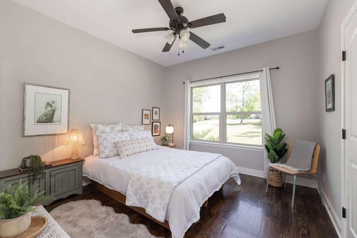 Generously sized guest room with large closet.