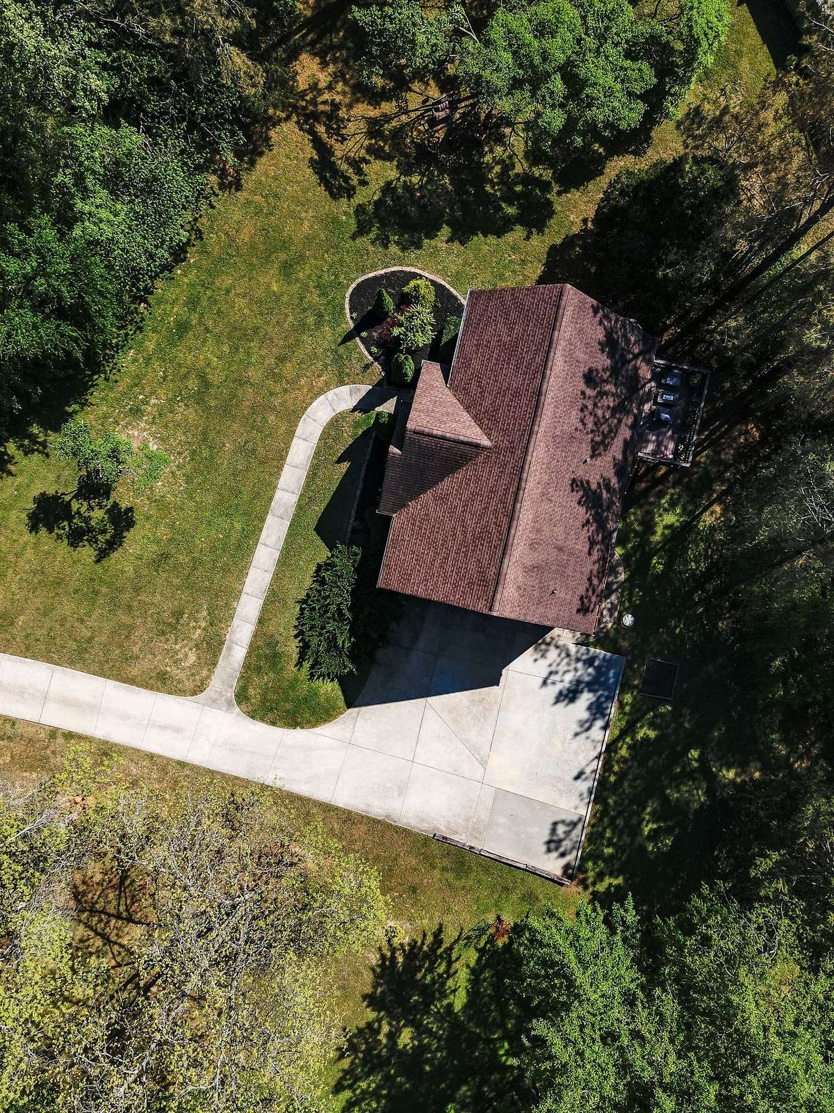Expansive parking with a two car garage and extensive parking pad, also room and power to hook up an RV.