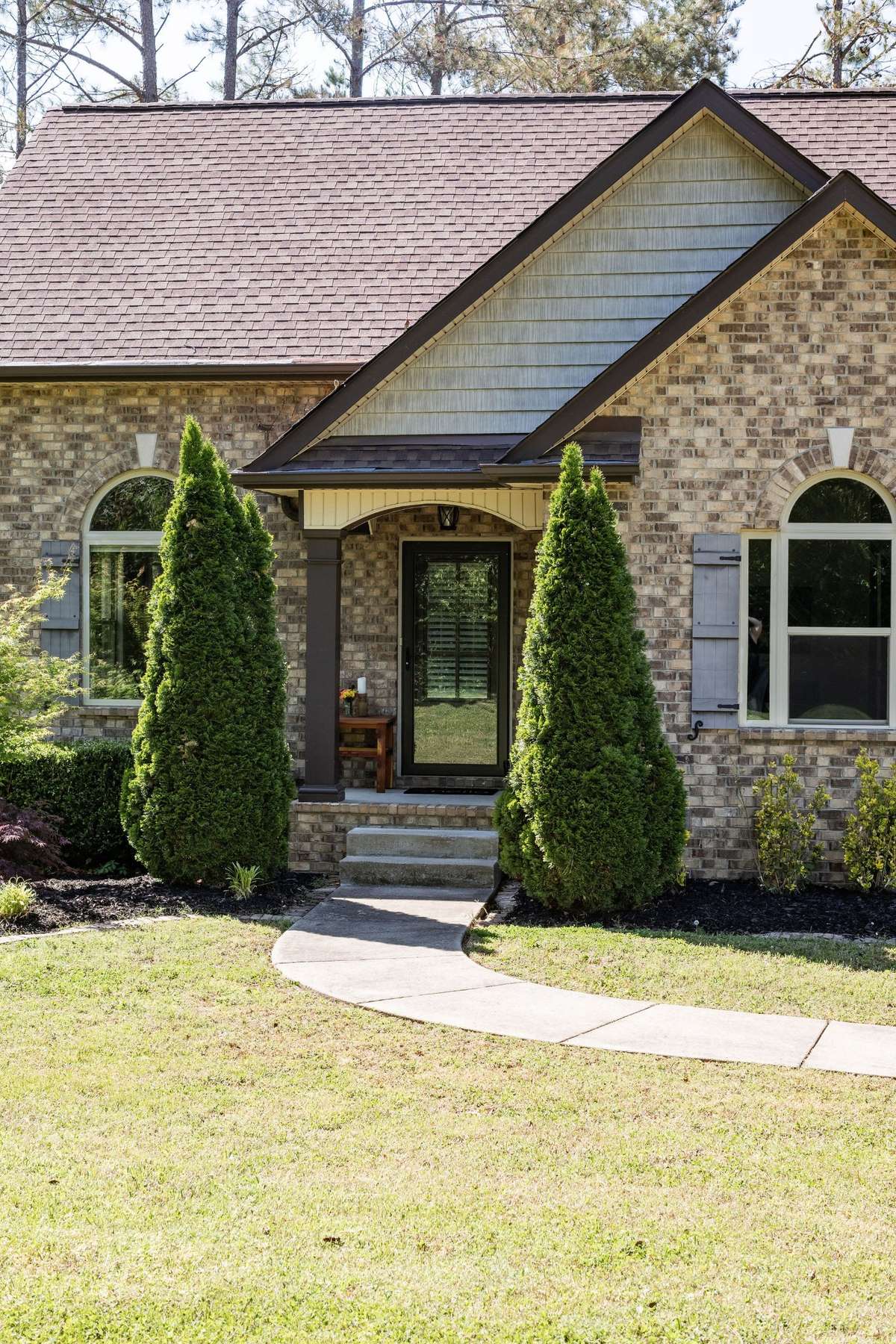 A covered front porch greets you.