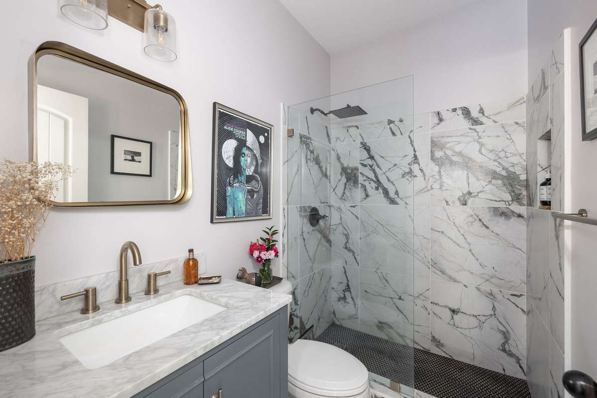 Completely updated guest bath with walk in shower.