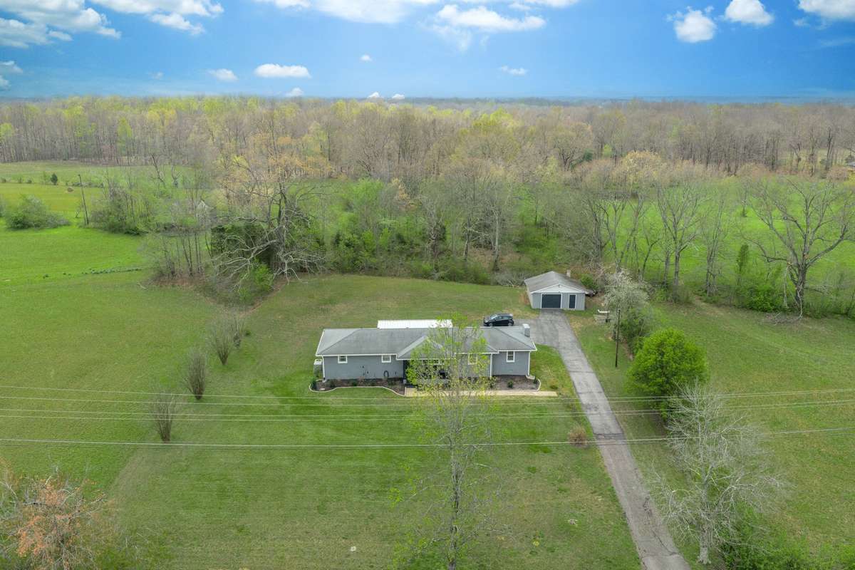 Location with Possibilities.....****ROAD FRONTAGE ON HWY. 100****
*Note: Green Grass Edits on all Exterior Photos