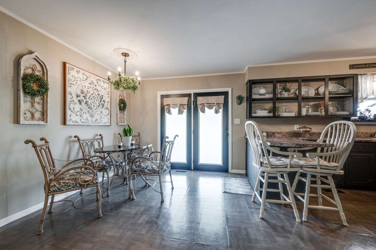 SPACIOUS Formal Dining Area that is Open to the 2nd Den