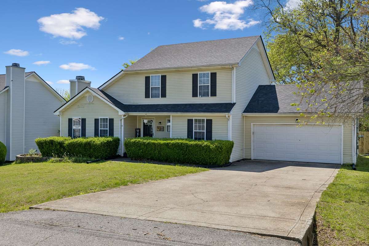 2 Car Garage with a large driveway