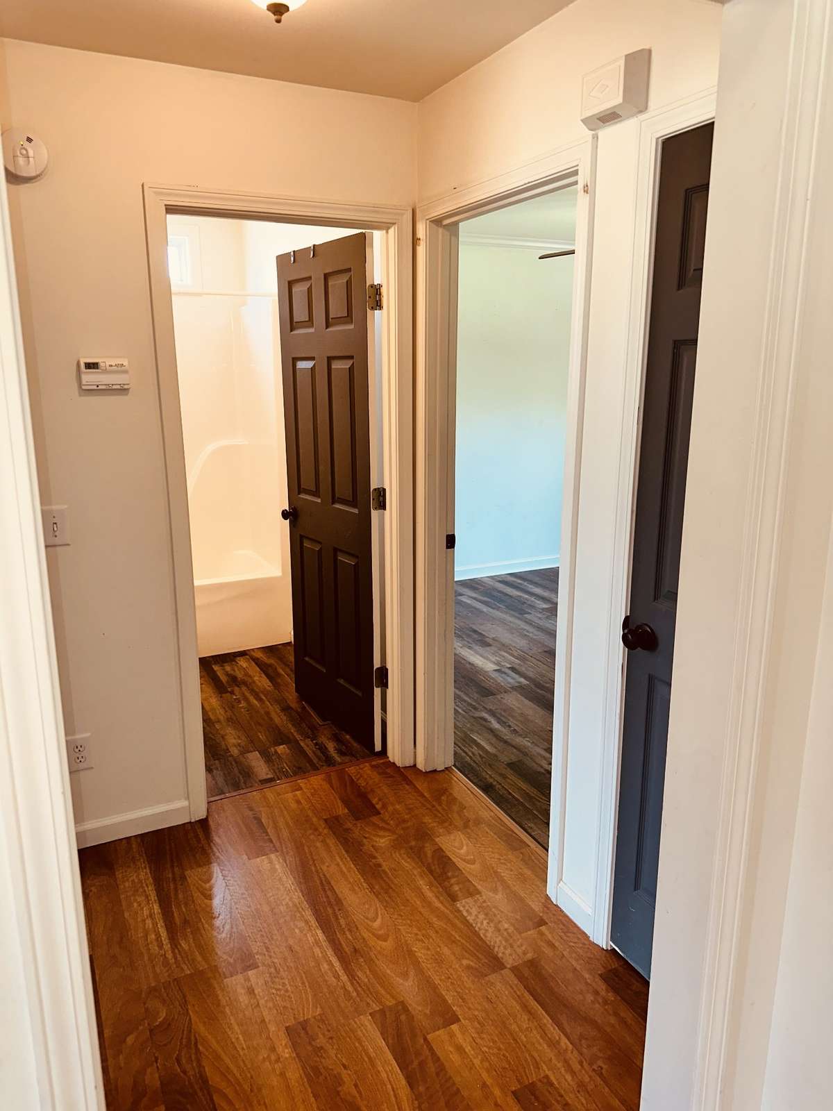 Hallway with 2 linen closets