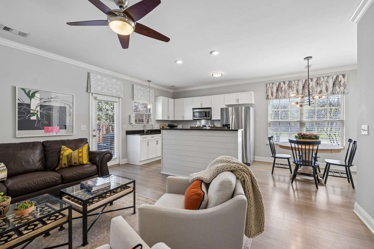 Plenty of space to gather here ~ the sunny views from the dining table provide a delightful backdrop for meals.