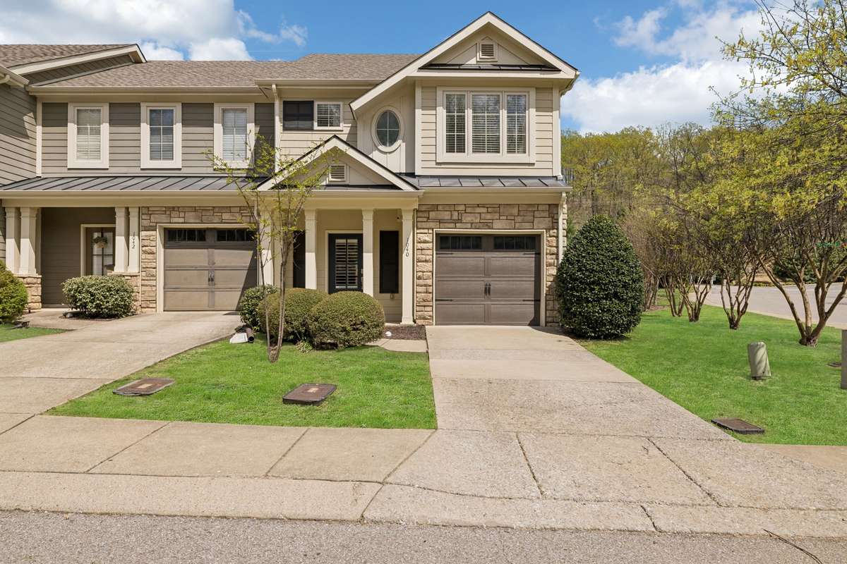 Welcome home to 1040 Woodbury Falls!