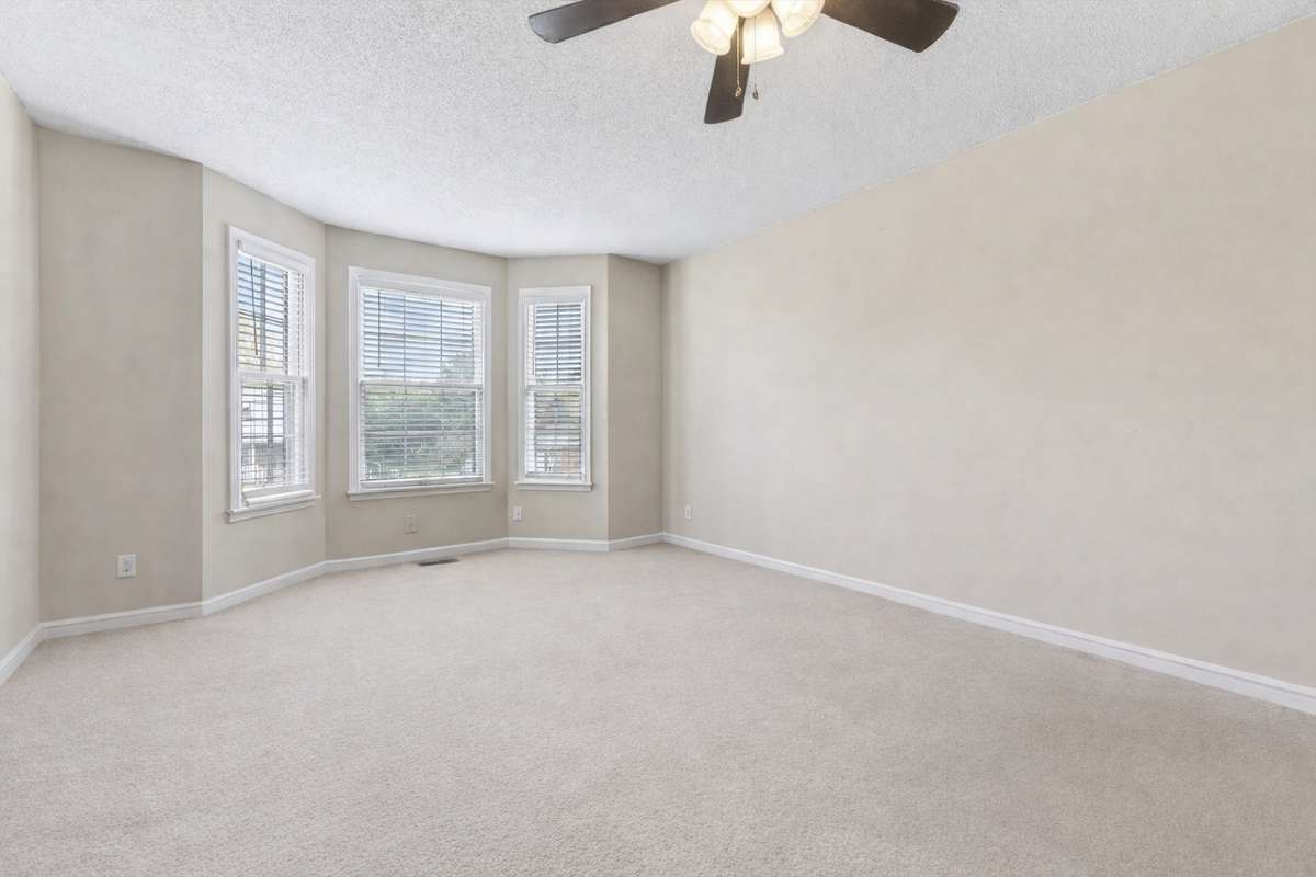 Bay window in upstairs bedroom. Photo digitally altered to remove furniture from room.