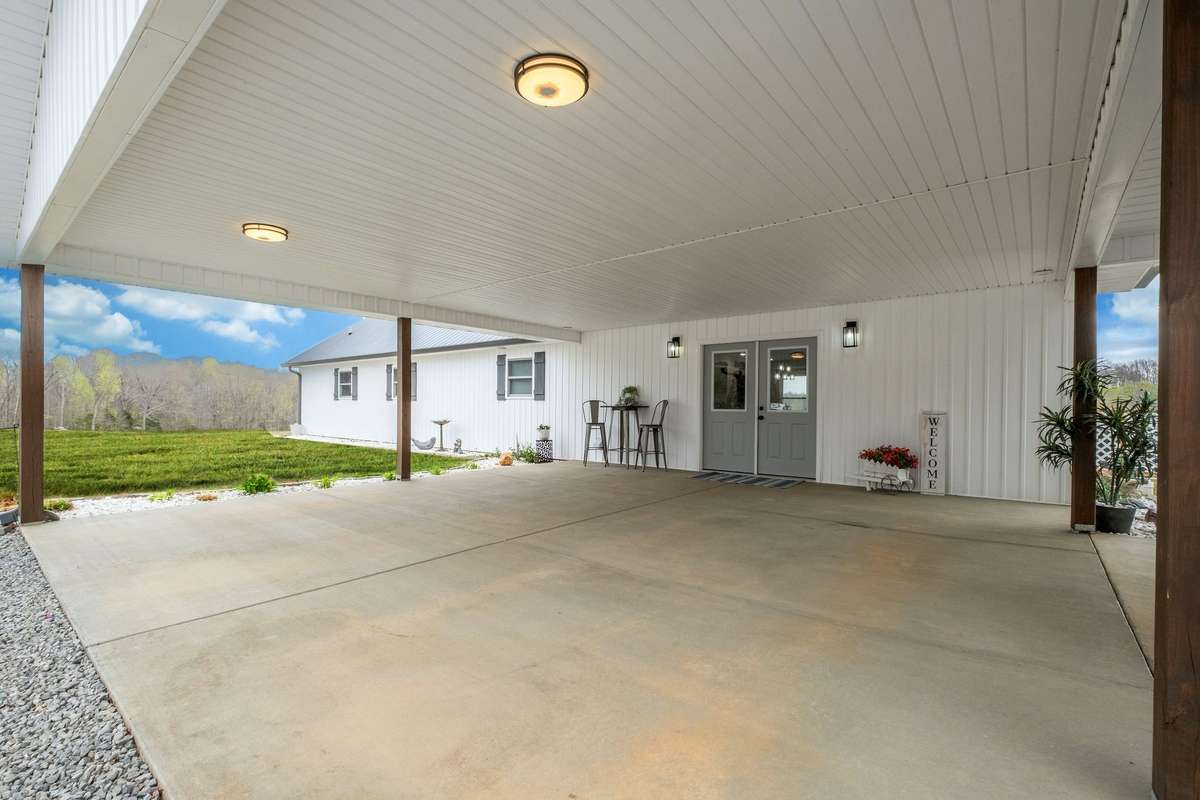 Carport attached to House (24x23) 
NOTE: Green Grass Edits on Exterior Photos