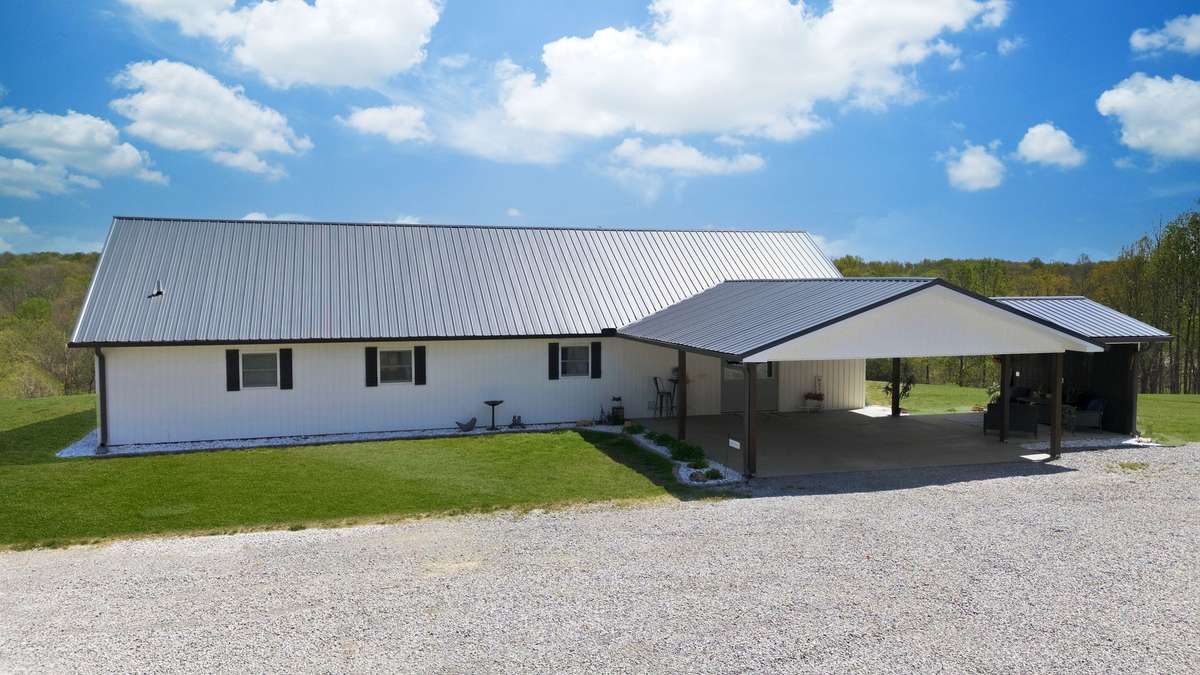 UPGRADED Metal Roof
NOTE: Green Grass Edits on Exterior Photos