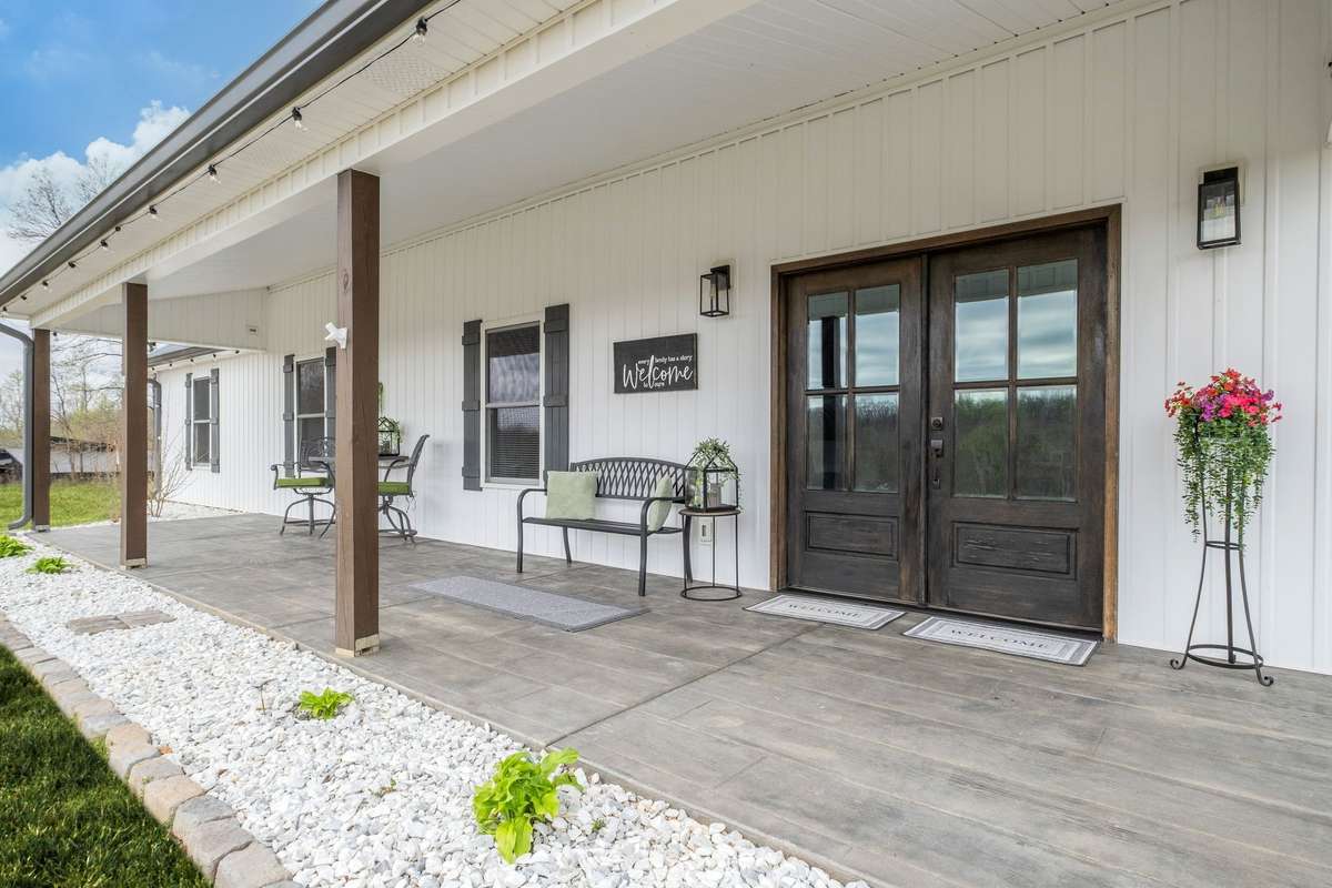 LONG Covered Front Porch
NOTE: Green Grass Edits on Exterior Photos