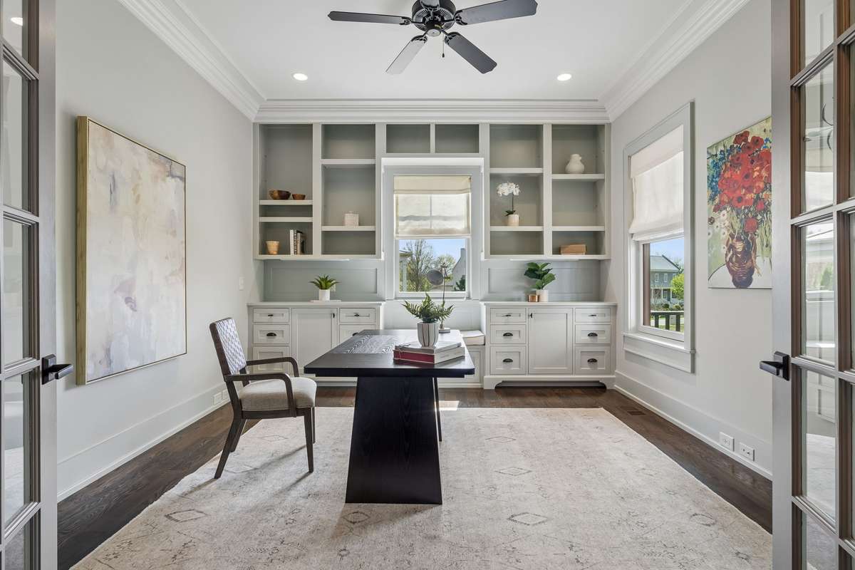 Office with custom built-ins and window seat