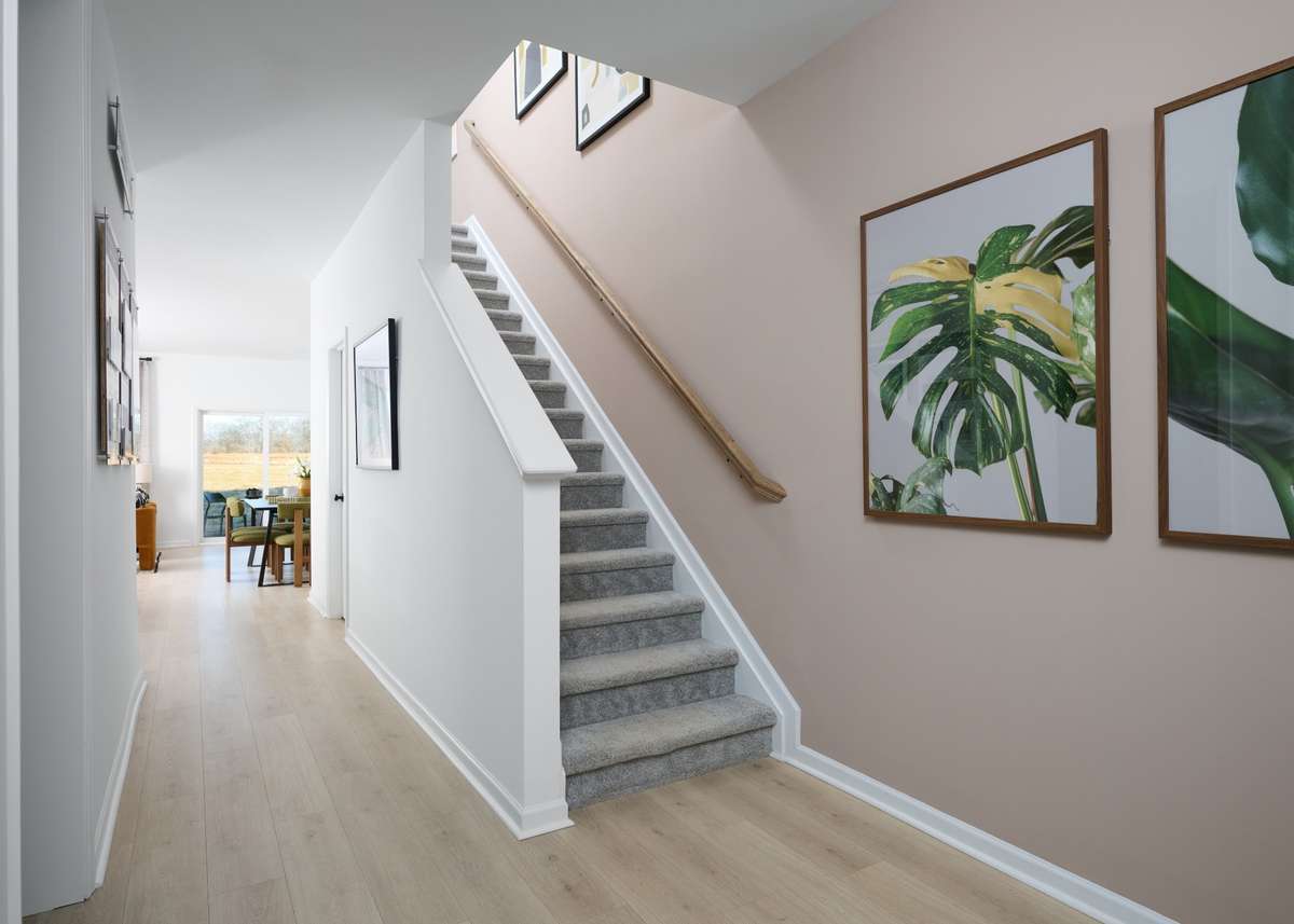 Open concept from the front door all the way to the back of the home. Photo is of the same floorplan but is the furnished model. Design options may change- see sales for specifics.