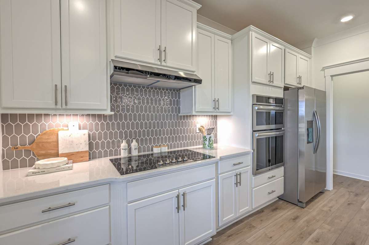 **Photos are of a model home and will not match all selections in subject property**
