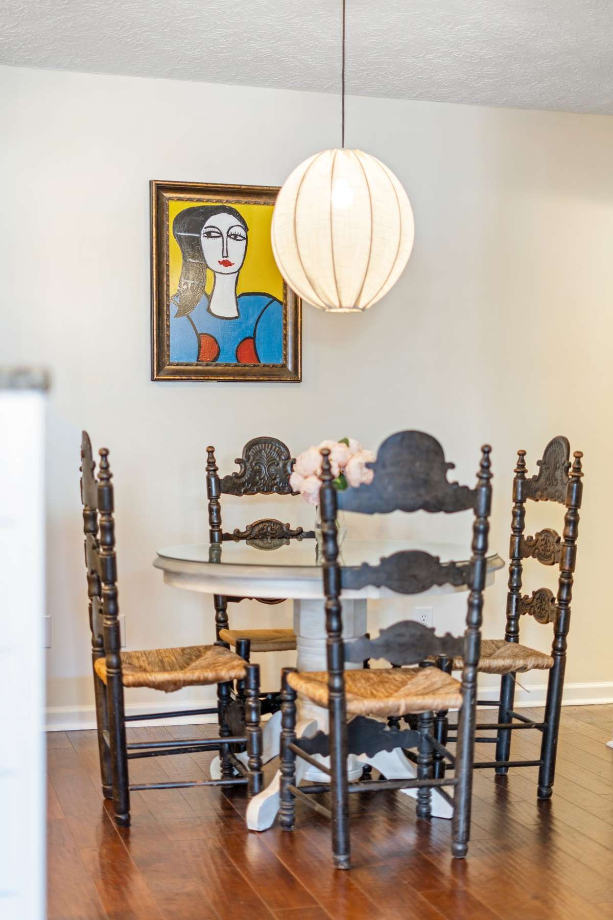 The combination dining space leads to the large pantry, powder bath and garage access.