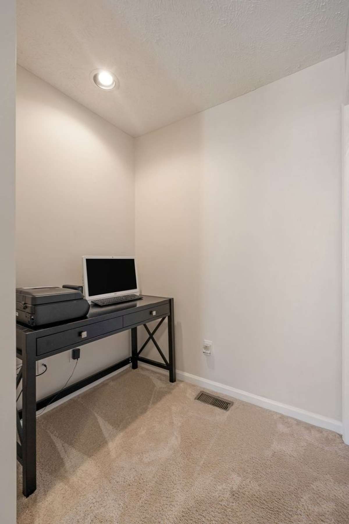 Two large suites surround a thoughtful laundry space + office/study nook...