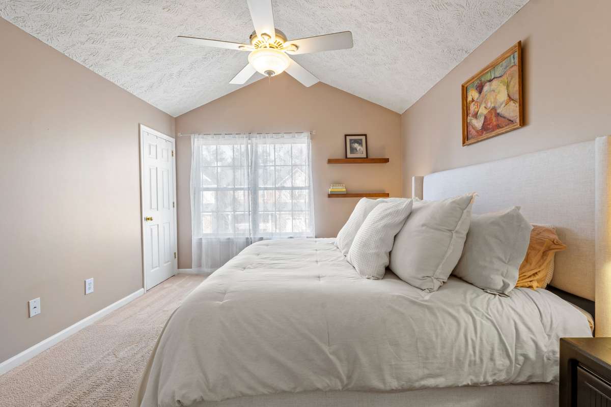 So much light in here... with an extra closet and high ceilings!