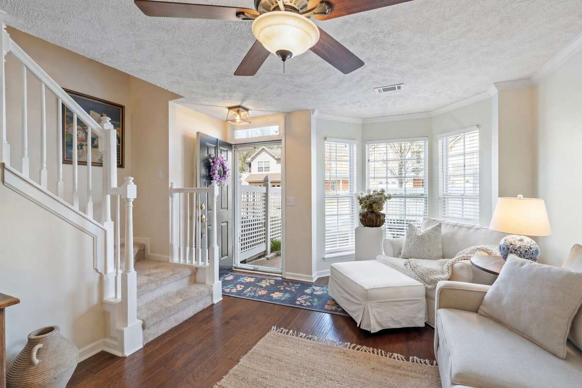 Upon entry, discover numerous upgrades from floor to ceiling - new light fixtures, Pella storm door and fresh paint to name a few.
