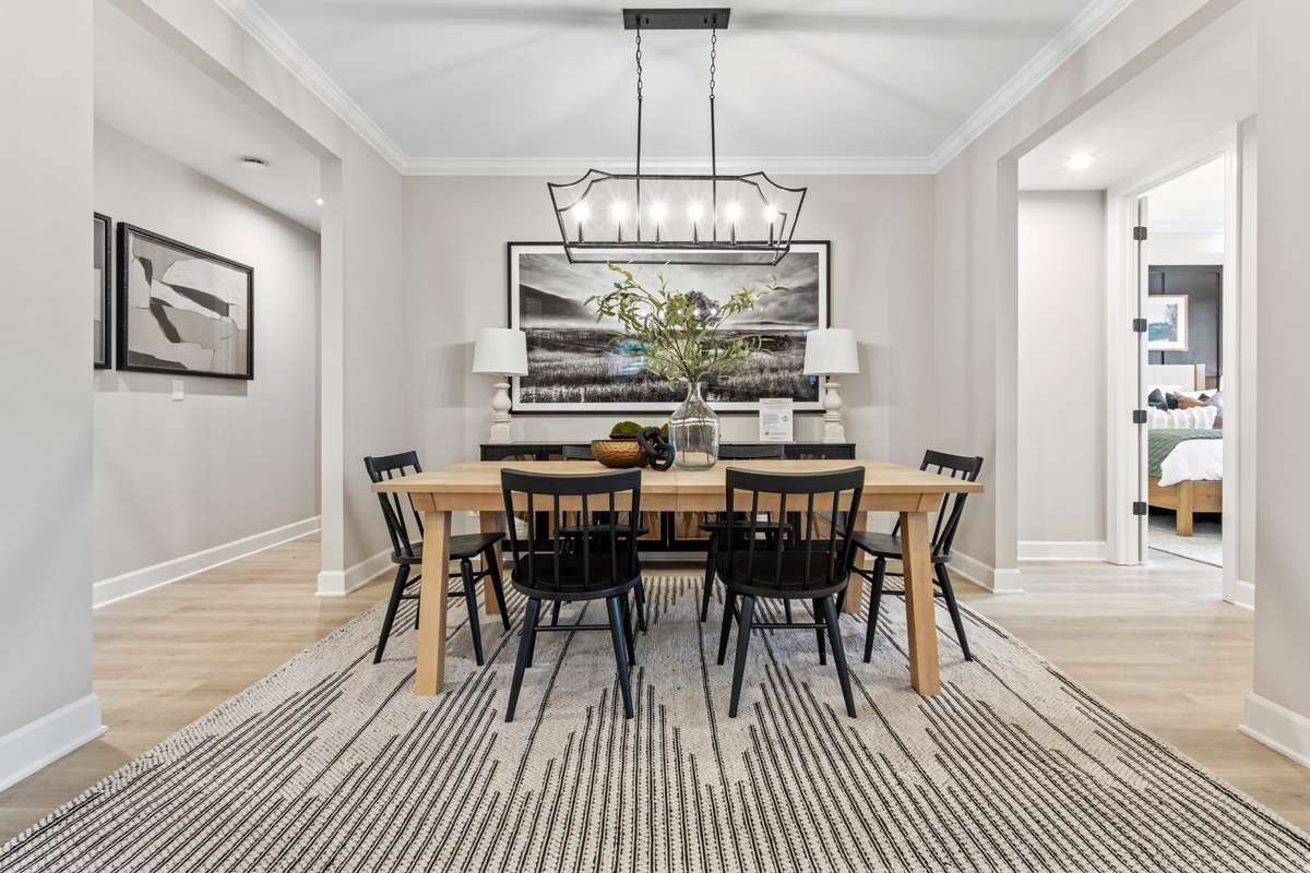 Dedicated dining area across from the kitchen make hosting dinner parties a breeze!