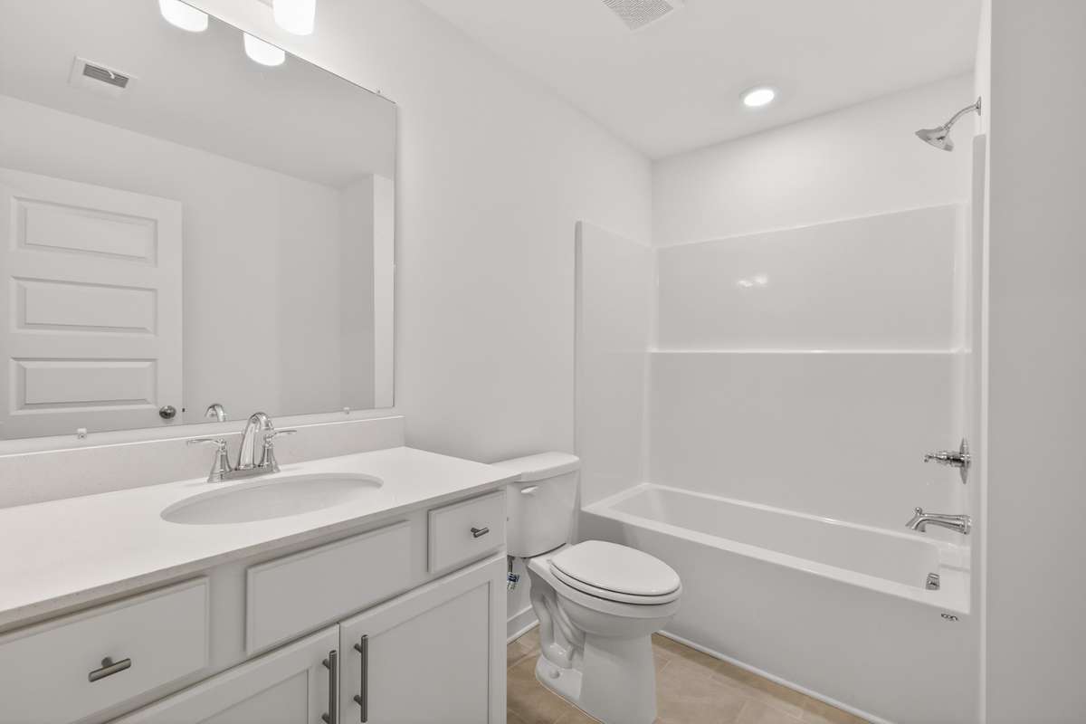 *Photos are of a model home and may not fully represent selections and features of the subject property.