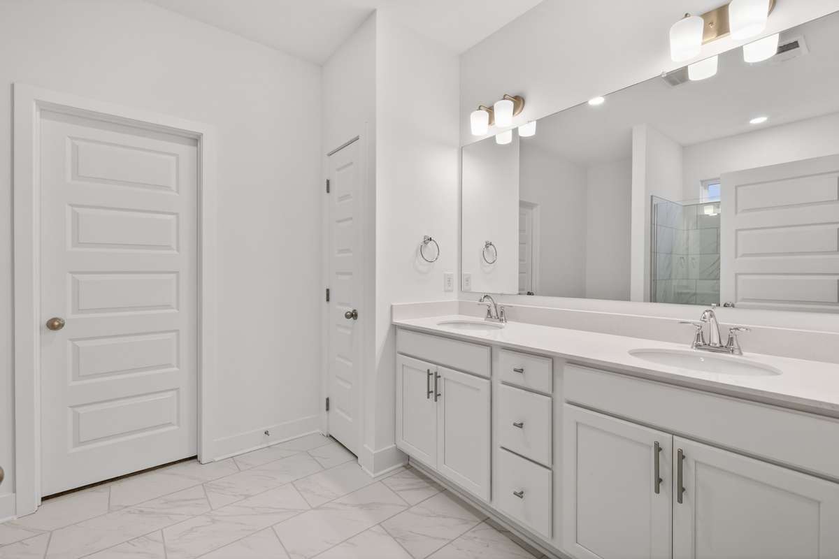 *Photos are of a model home and may not fully represent selections and features of the subject property.